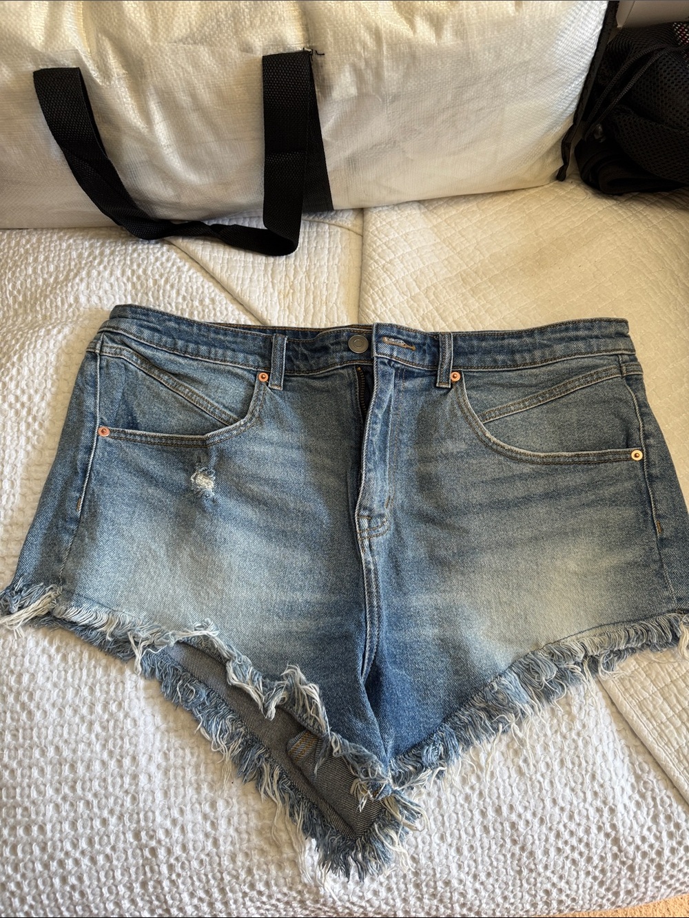 High-Rise Light Blue Distressed Denim Booty Shorts